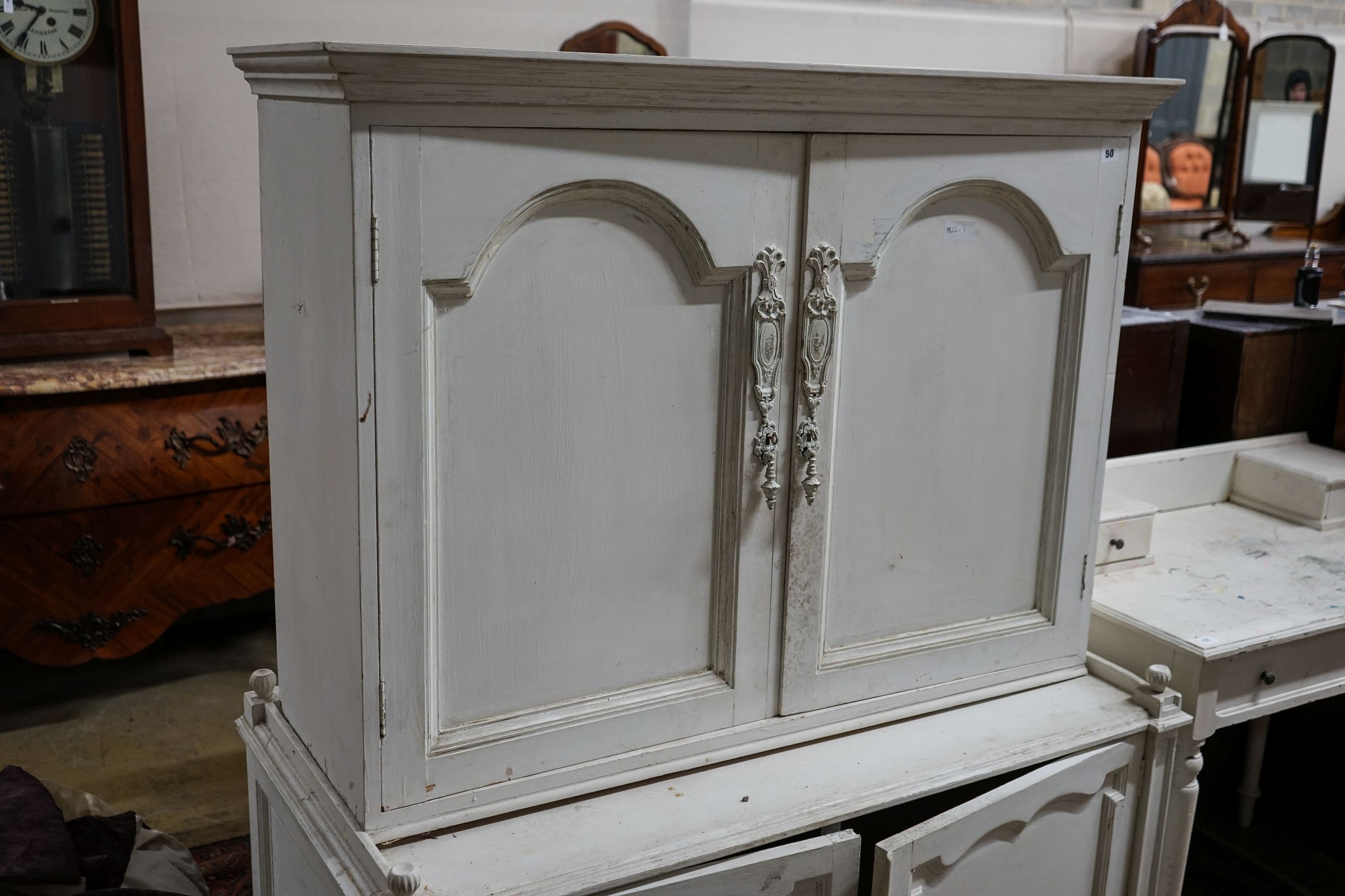 A painted four door cabinet, width 118cm, depth 60cm, height 152cm